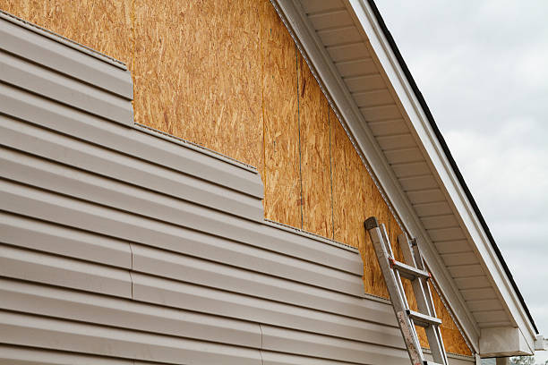 Professional Siding Replacement technician working in Collegeville, PA